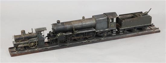 A scratchbuilt model of a 262 steam powered locomotive and tender,